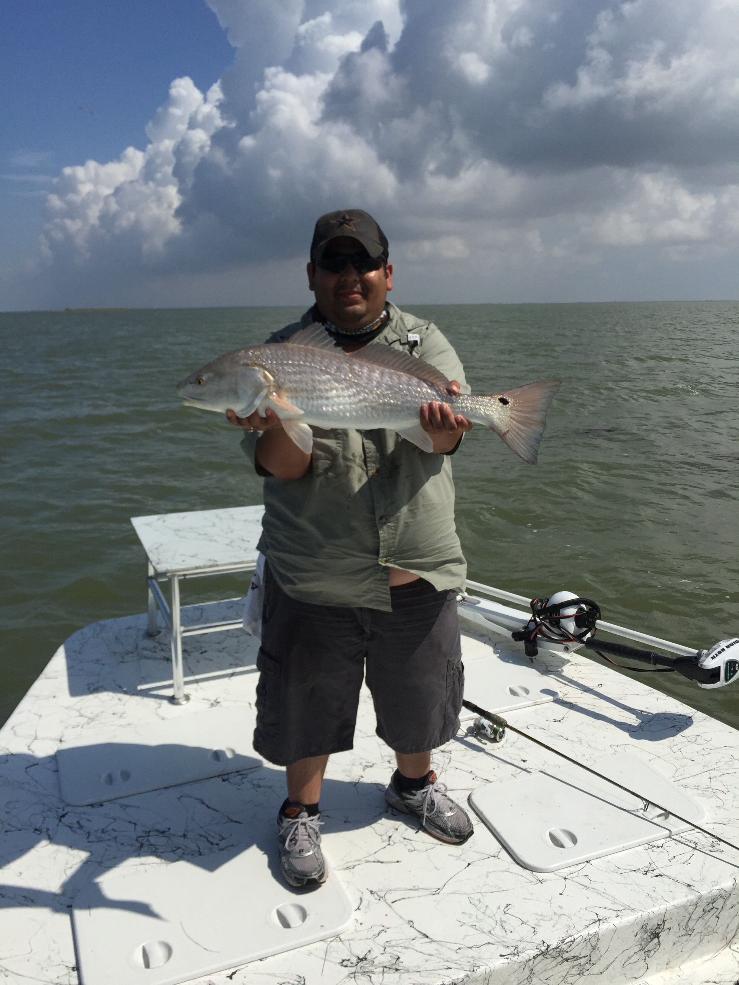 Jorge with 27in redfish Port Mansfield fishing guide
